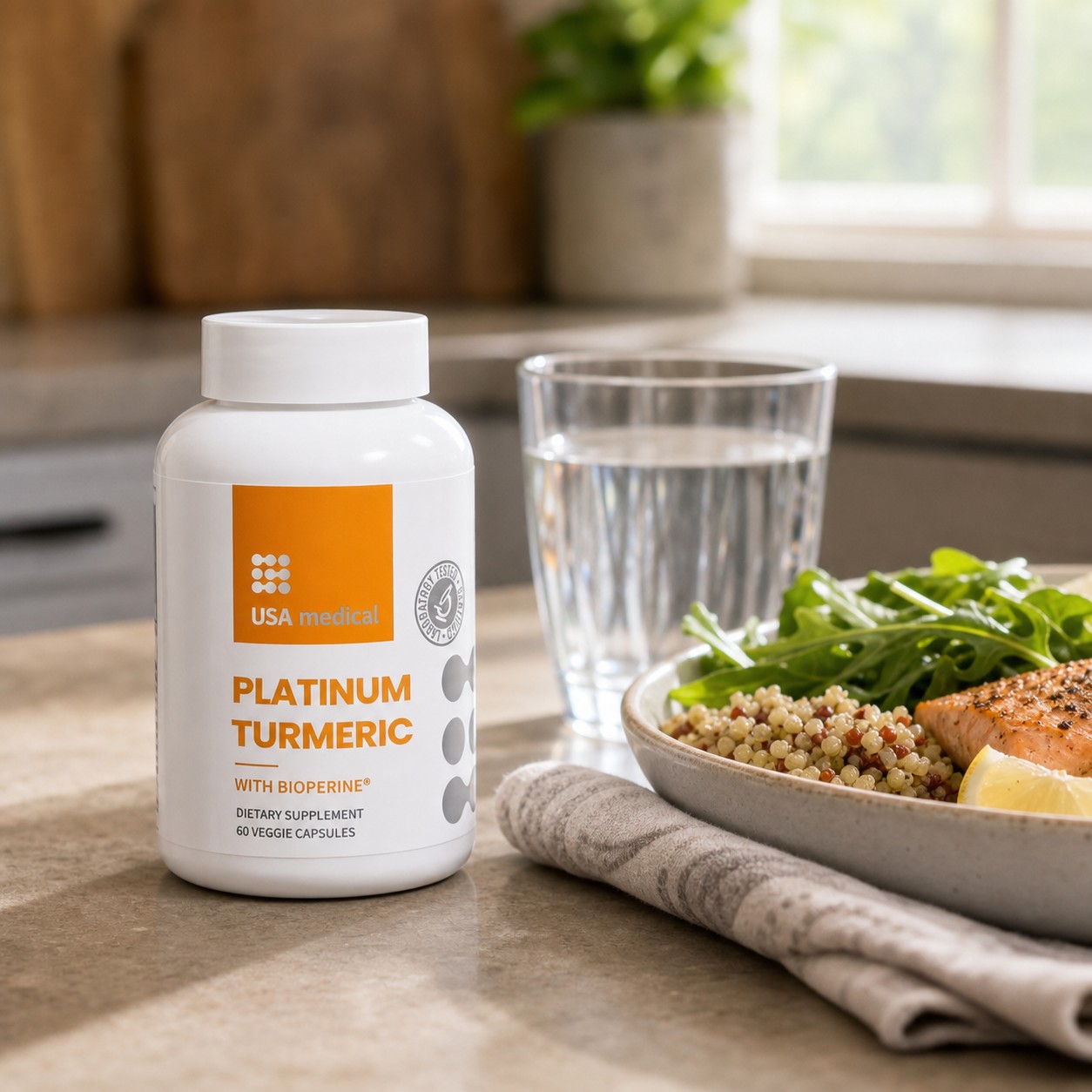 USA Medical Platinum Turmeric with BioPerine bottle beside a healthy lunch and water