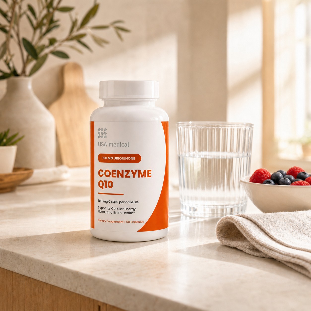 USA Medical Coenzyme Q10 bottle beside water and berries in a sunlit kitchen